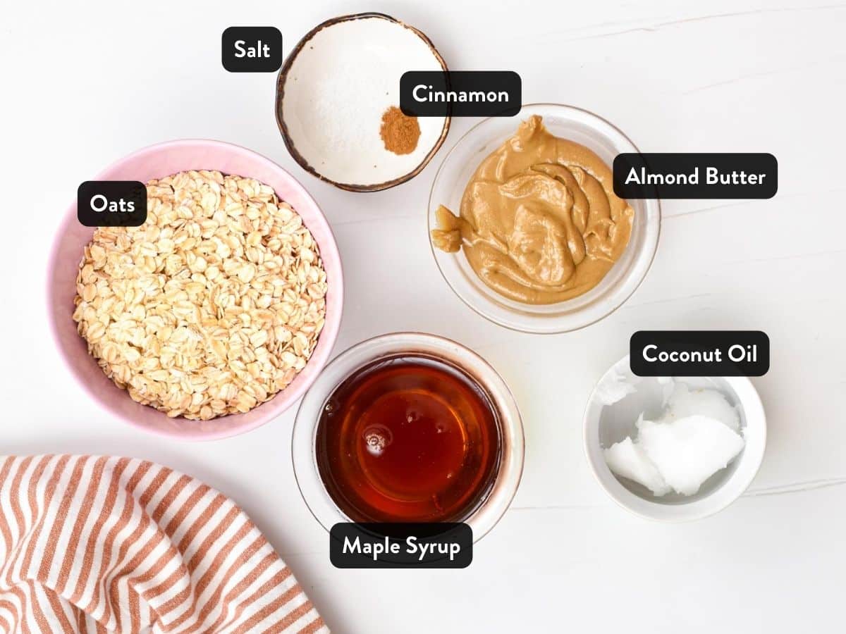 Ingredients for No-Bake Almond Butter Cookies in small bowls and ramekins with labels.
