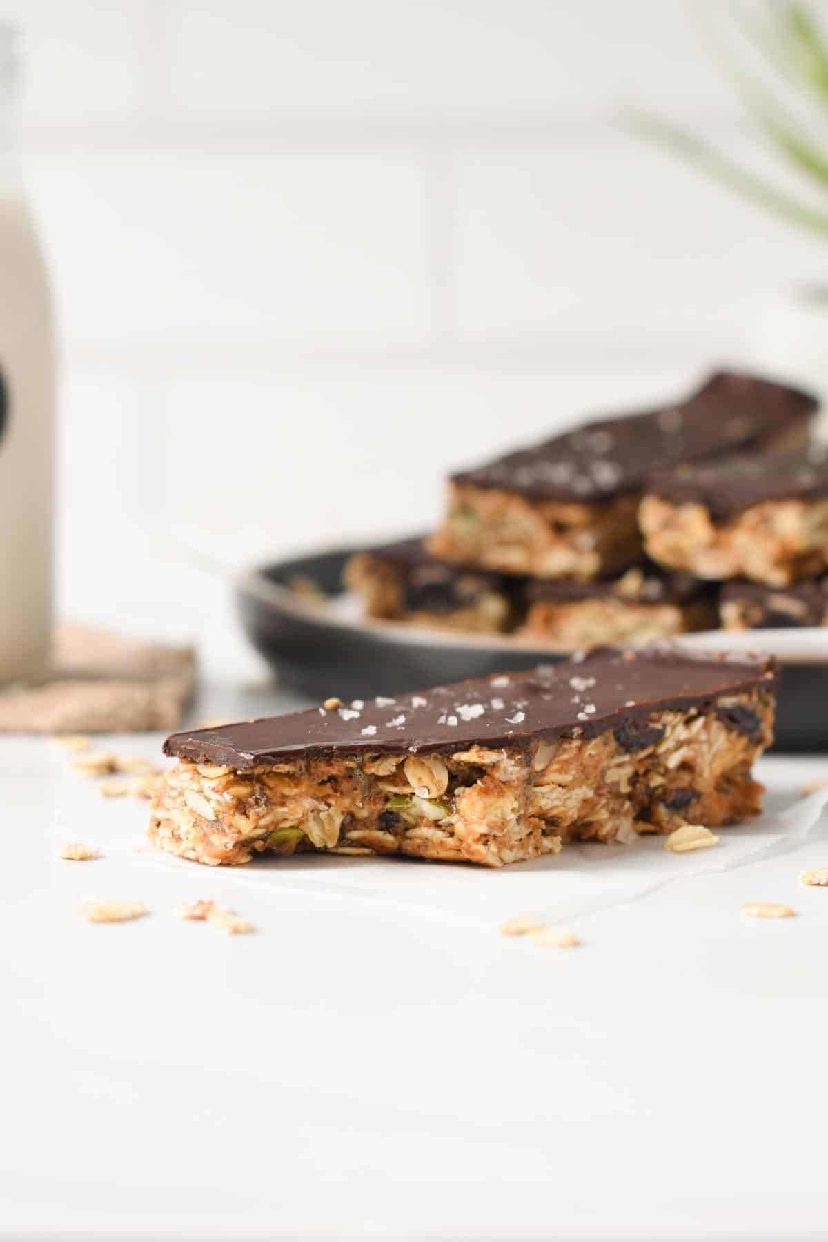 No Bake Granola Bar in front of the plate with other bars.