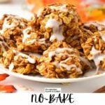 a plate filled with a stack of no-bake pumpkin cookies topped with a drizzle of icing sugar