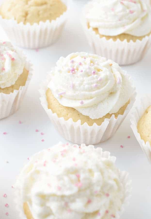 Easy Vegan Vanilla Cupcake with the Vegan Vanilla Frosting decorated with sprinkles