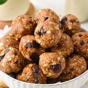 a bowl filled with No Bake Peanut Butter Oatmeal Energy Balls filled with chocolate chips