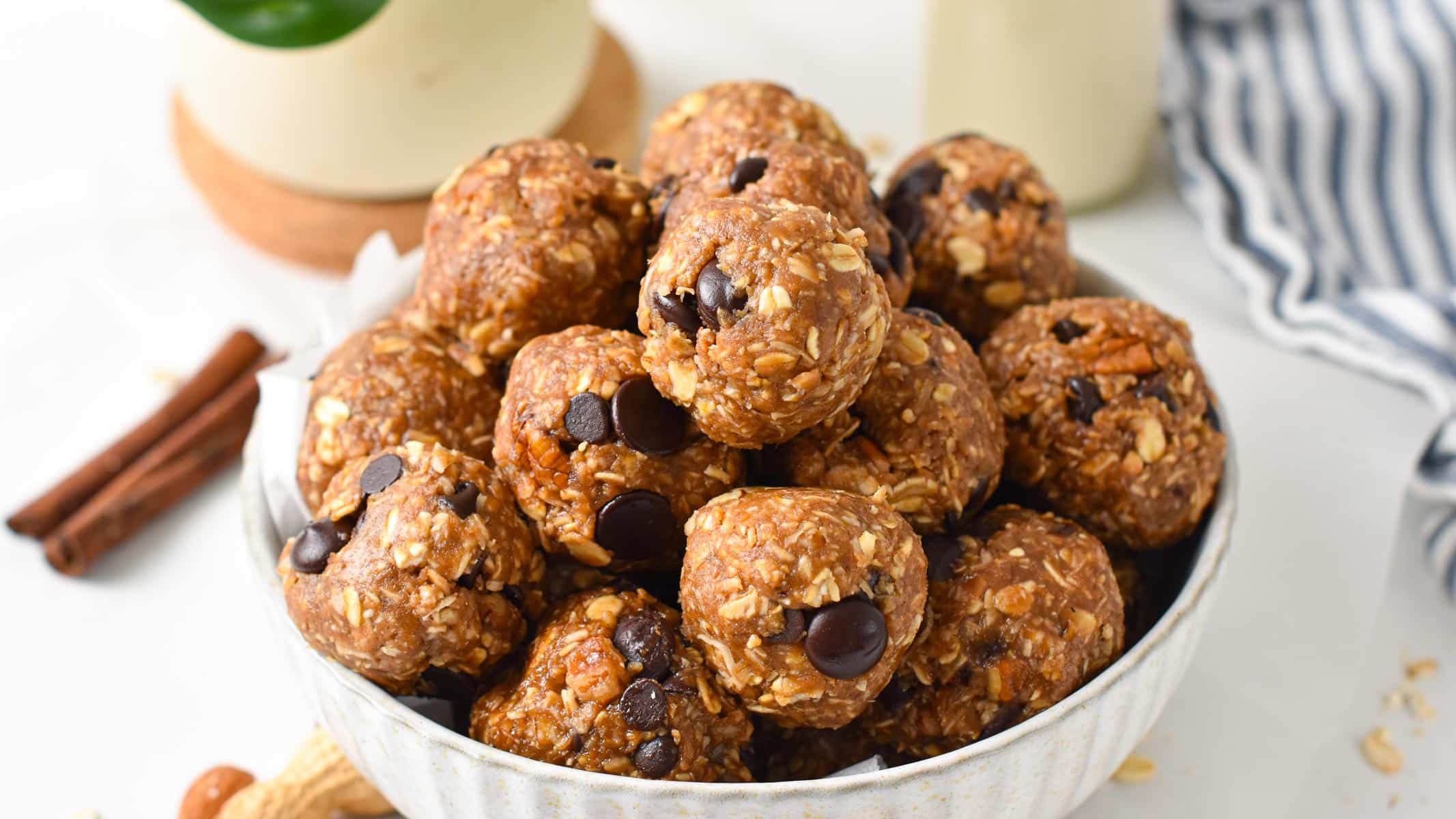 a bowl filled with No Bake Peanut Butter Oatmeal Energy Balls filled with chocolate chips