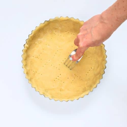 Pricking the crust for the Vegan Pecan Pie
