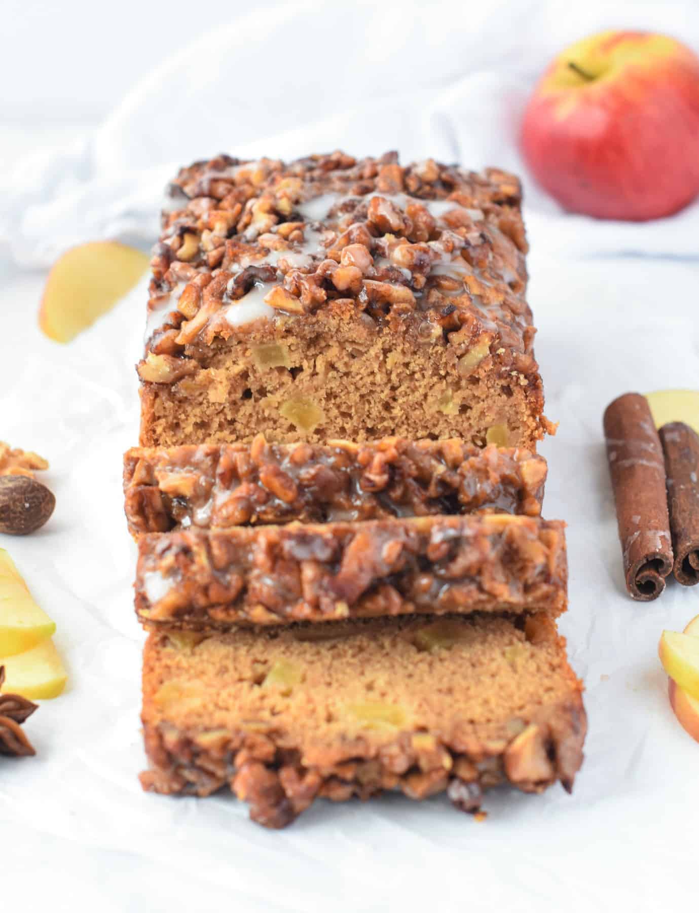 Apple walnut bread with the first bit sliced.
