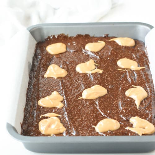 Vegan banana brownie batter in a baking pan.