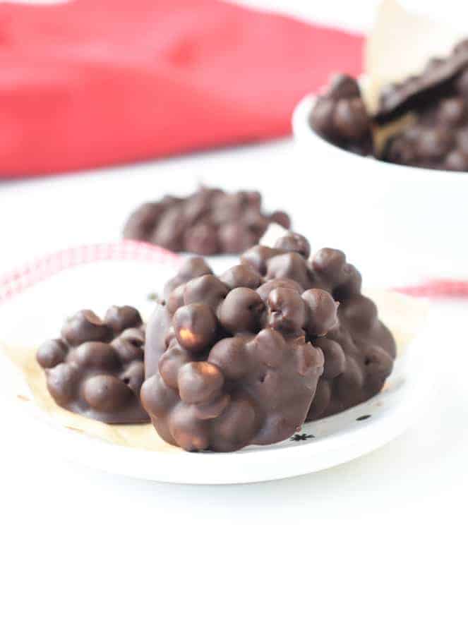 Chocolate covered chickpeas stacked.