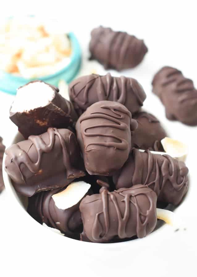 Raw bounty bars stacked in a bowl.