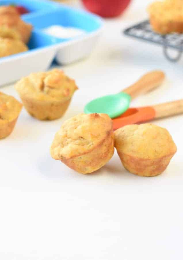 Baby Led Weaning Muffins next to colorful spoons.