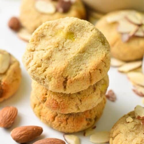 a stack of three Almond Flour Banana Cookies with whole almonds