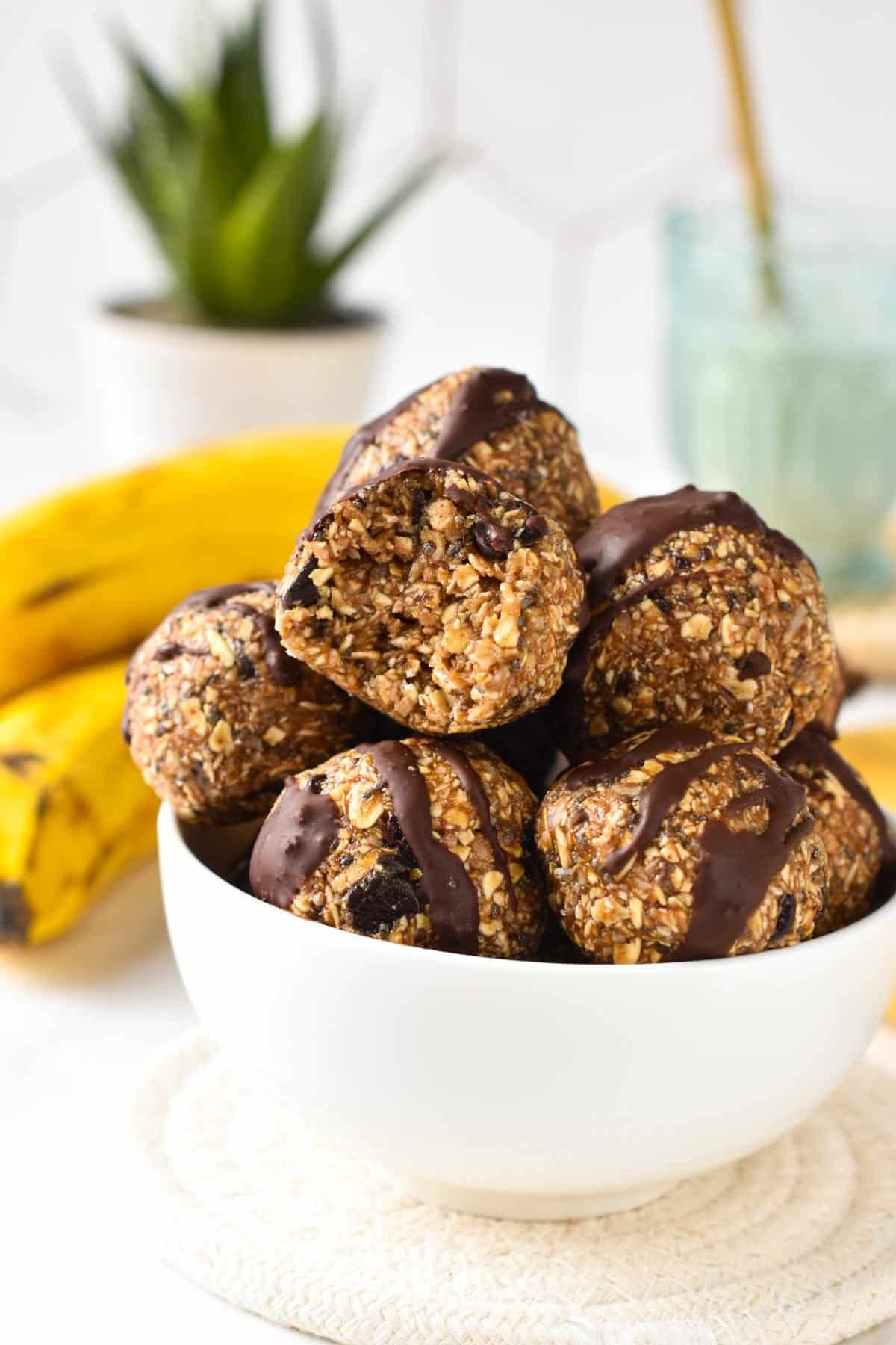 These peanut butter banana energy bites with chocolate chips are healthy breakfast on the go or post-workout energy bites to refuel with healthy carbs and plant-based protein.