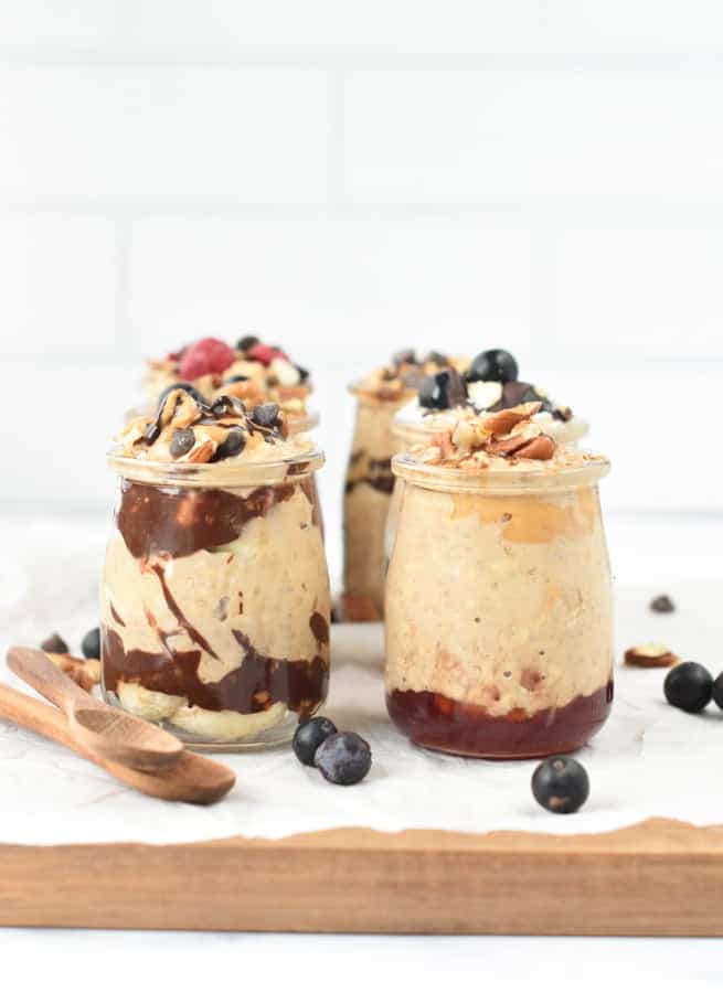 Overnight oats with protein powder in small mason jars.