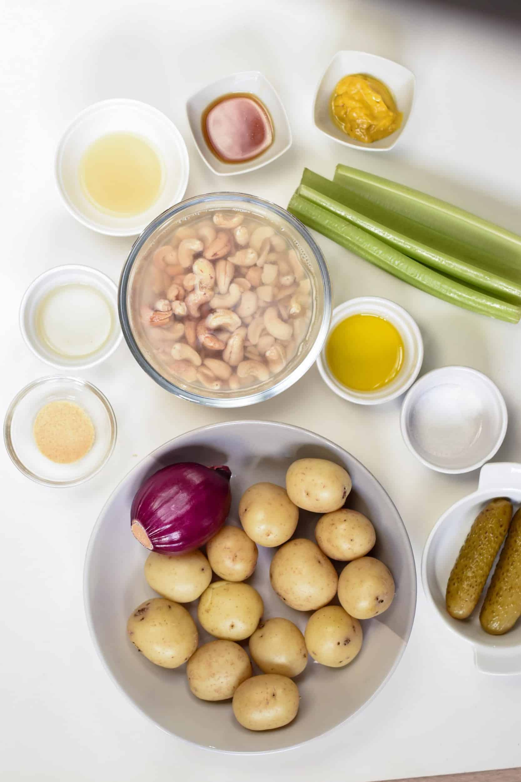 Vegan Potato Salad ingredients in bowls and ramekins.