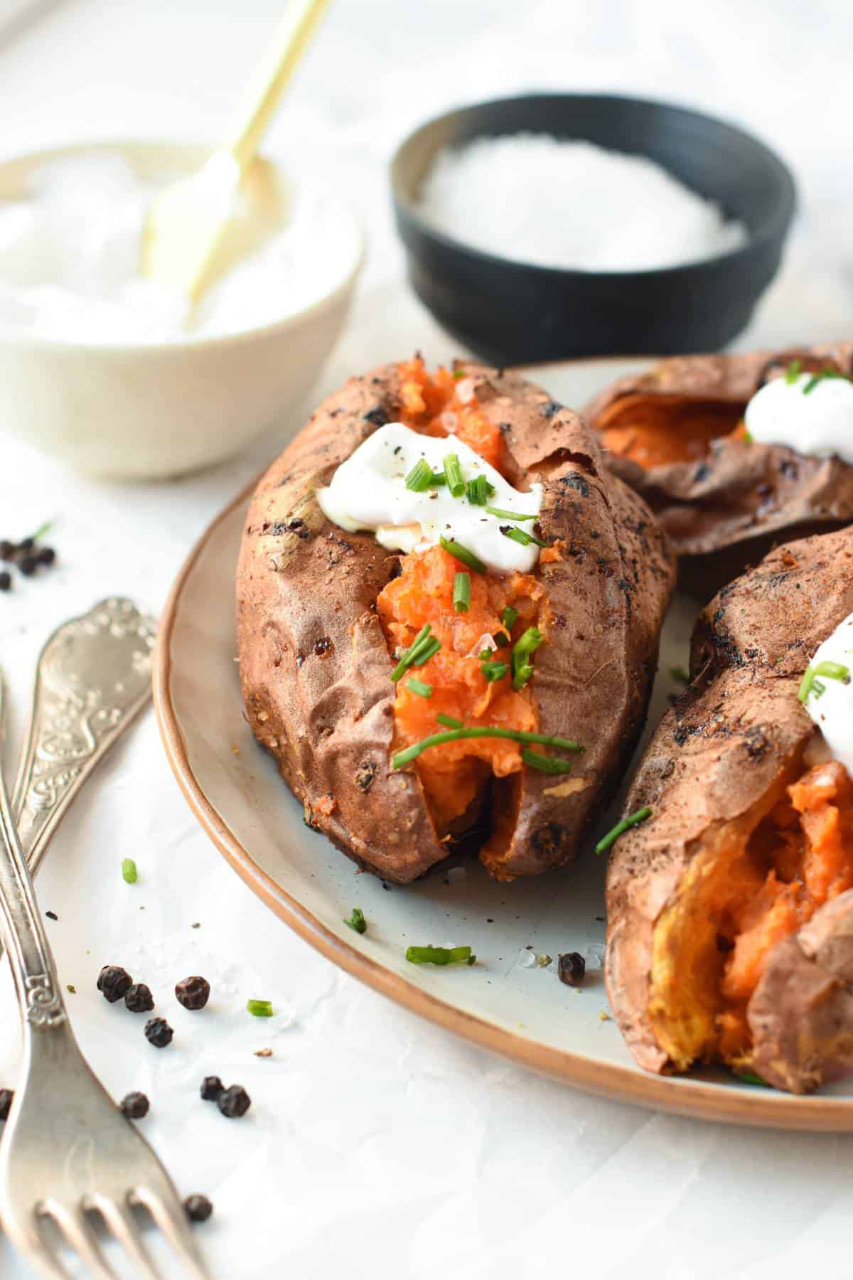 Air Fryer Sweet Potato with cream and chopped dill.