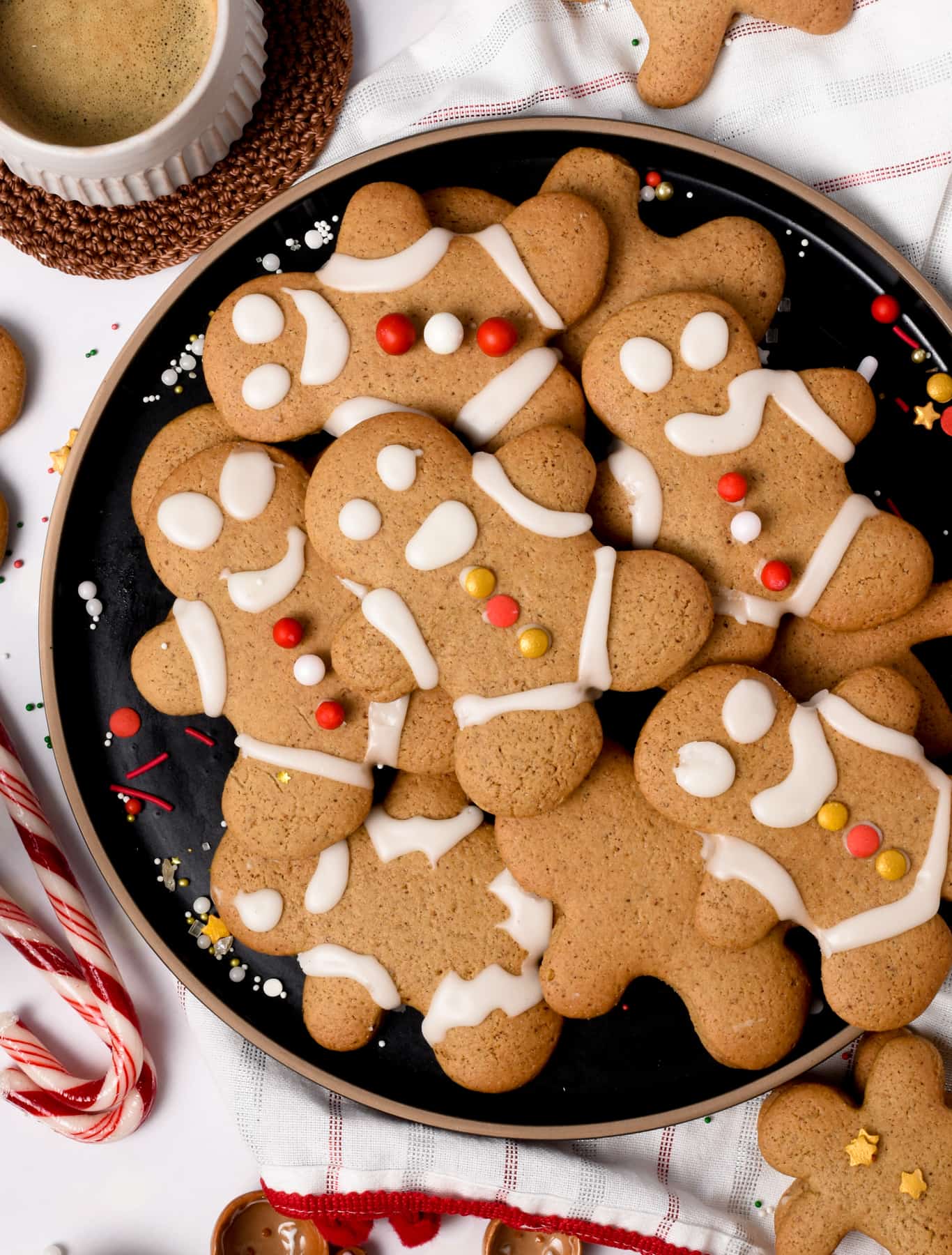 Vegan Gingerbread Cookies on a black plate.