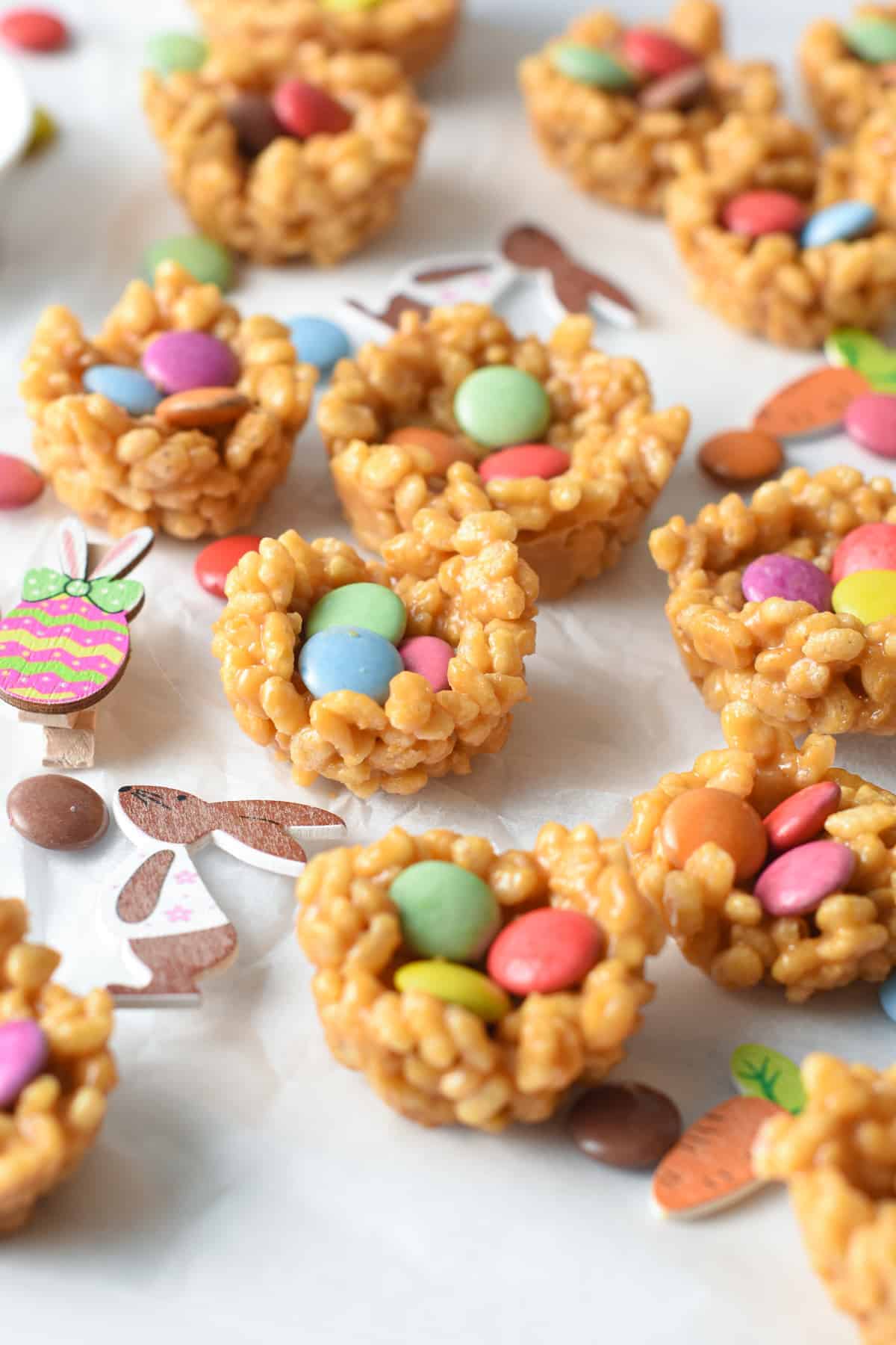 Easter Rice Krispie Nests decorated with plant-based chocolate candies.