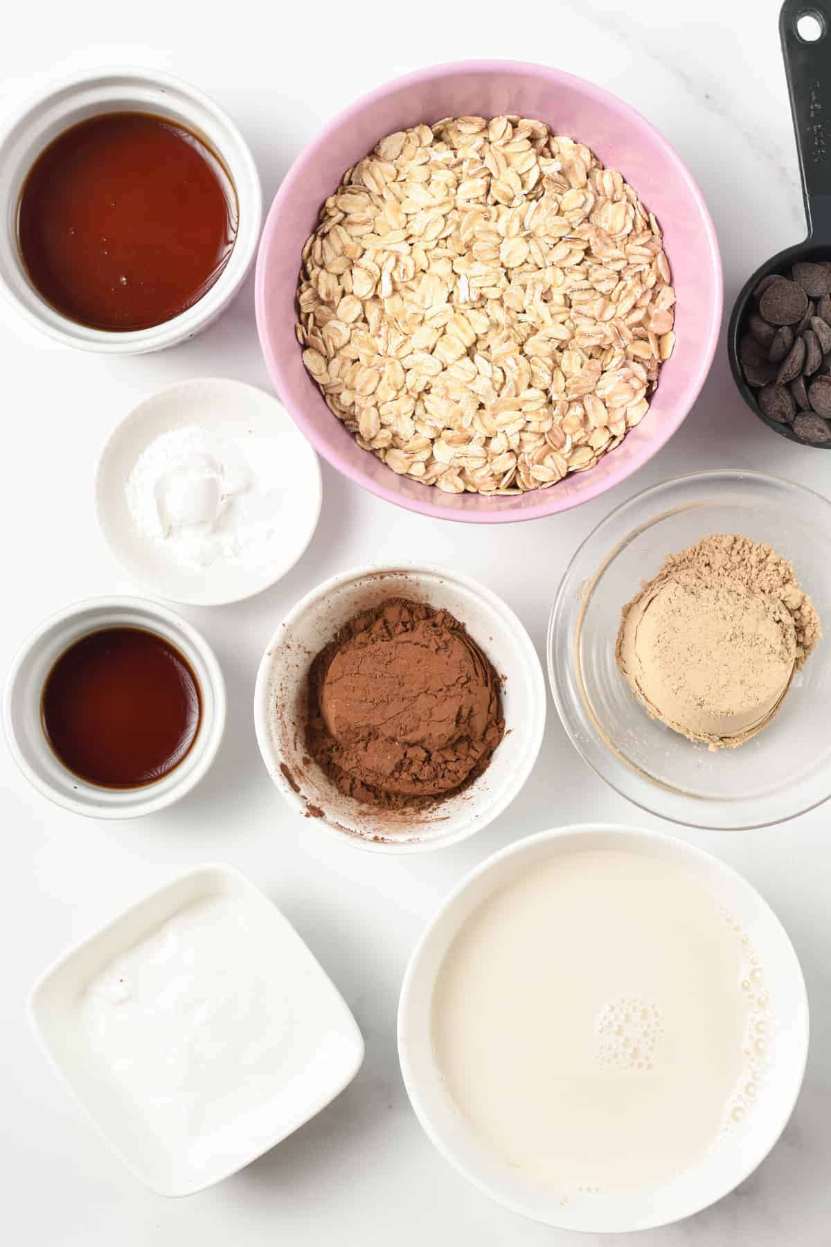 Protein Powder Brownies ingredients in bowls and ramekins.