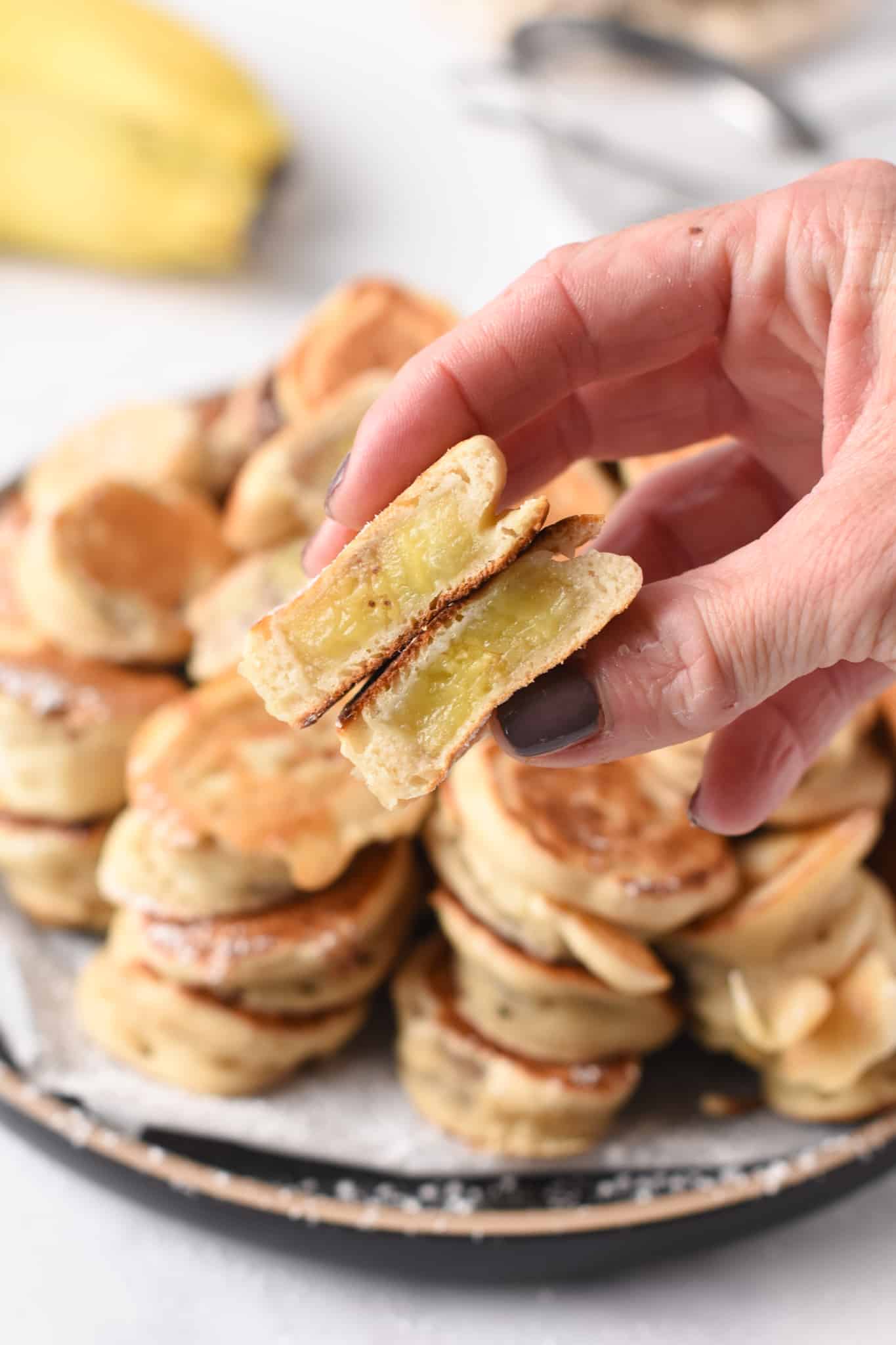 Banana Pancake Bites sliced into halves to show the inside.