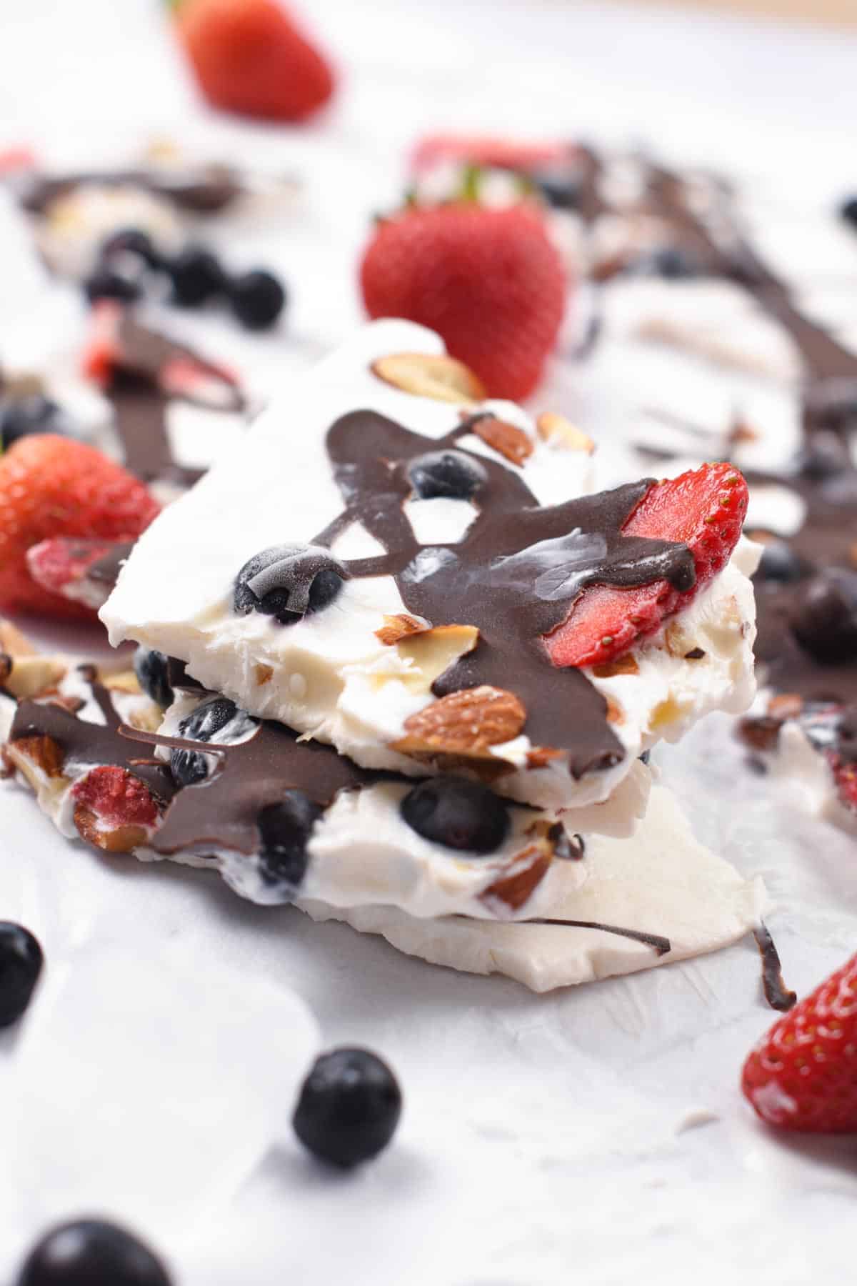 Frozen Yogurt Bark broken in blocks and stacked.