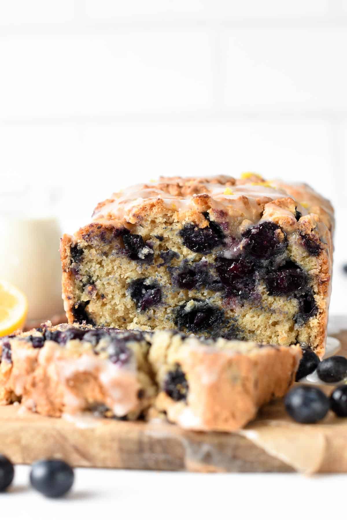 Healthy Blueberry Bread with the first bit sliced.