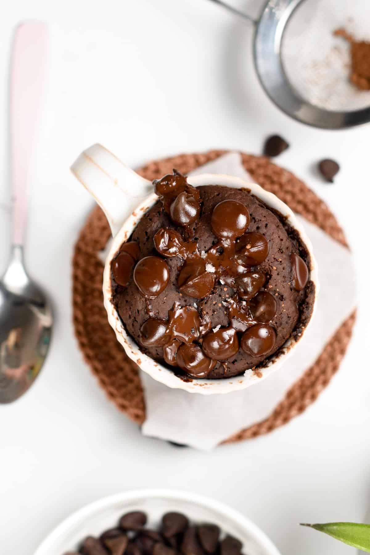 Gooey Chocolate Mug Cake with melted chocolate chips.