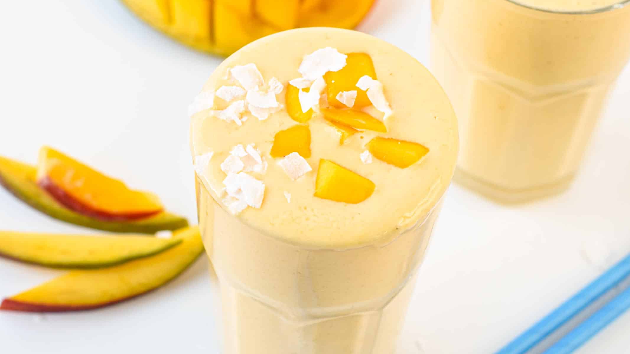 This creamy refreshing Mango Protein Smoothie recipe is the perfect post-workout high-protein smoothie packed with 25 grams of protein.