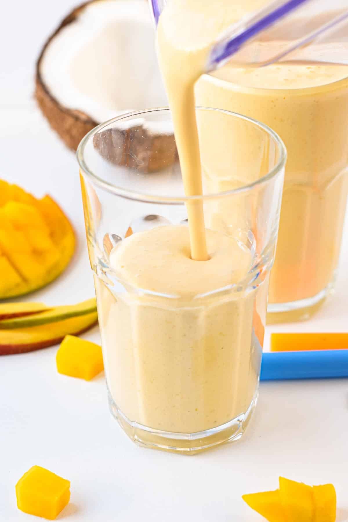 This creamy refreshing Mango Protein Smoothie recipe is the perfect post-workout high-protein smoothie packed with 25 grams of protein.