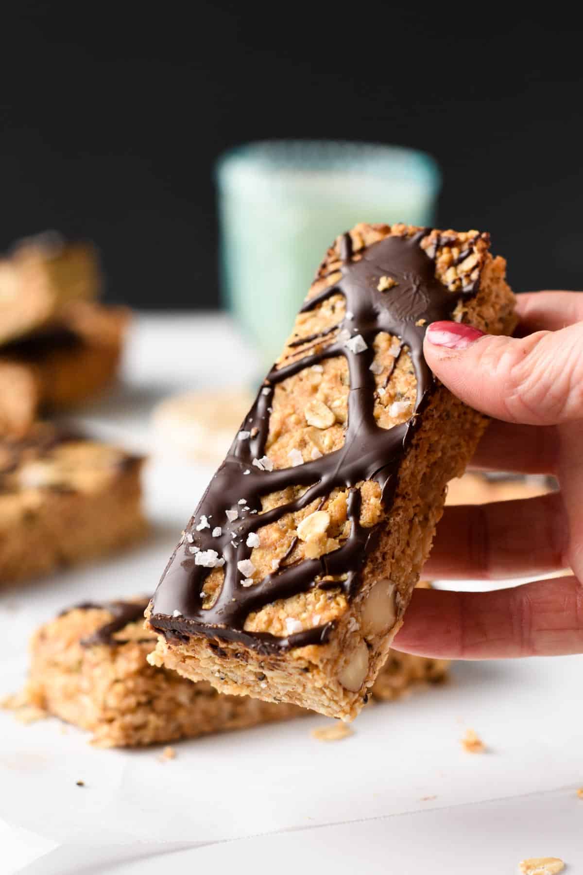 Peanut Butter Granola Bars held in a hand.