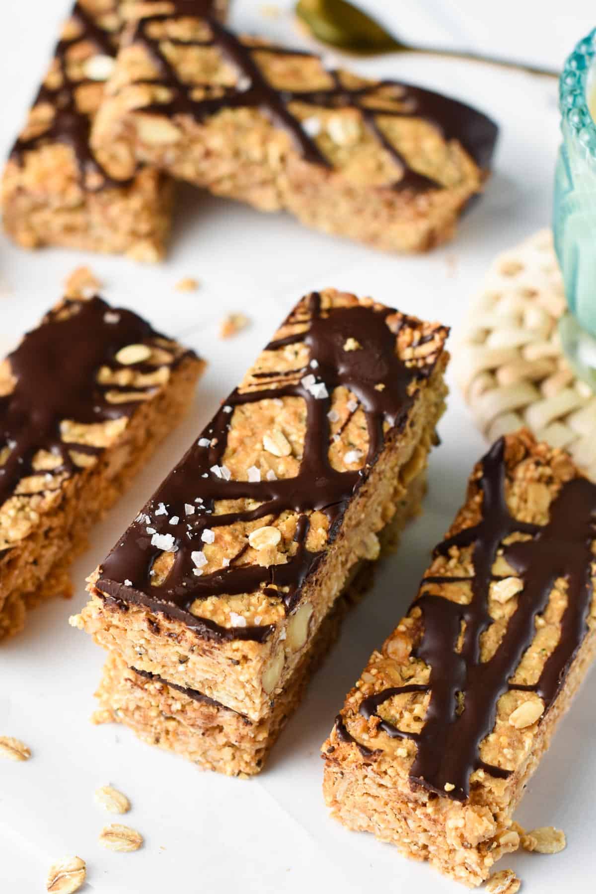 Peanut Butter Granola Bars stacked on a table.