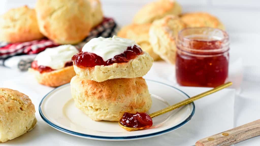 Vegan Scones stacked on a plate.