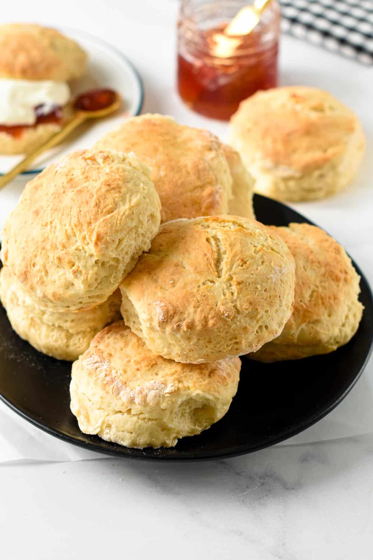 Vegan Scones on a black plate.