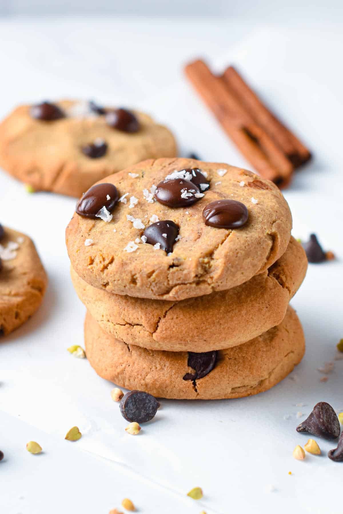 Buckwheat Cookies stacked on a white table.