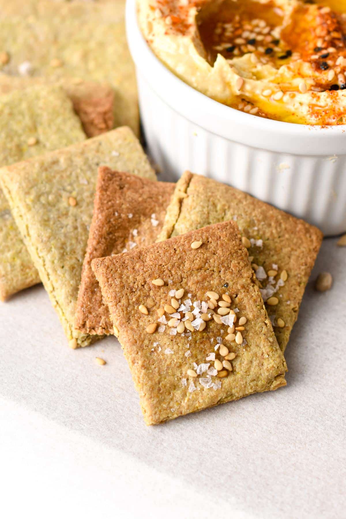 Sunflower Seed Crackers decorated with salt and sesame seeds.