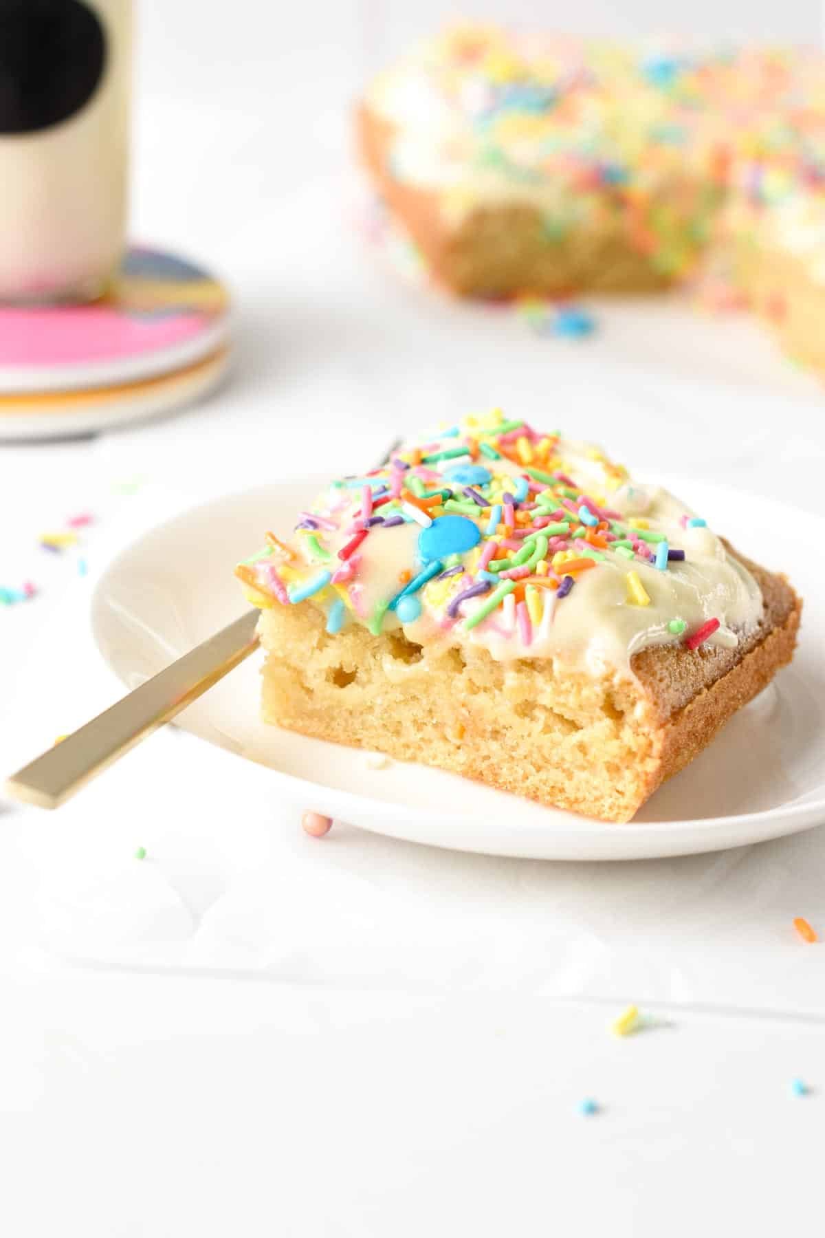 Vanilla Wacky Cake slice on a small plate.