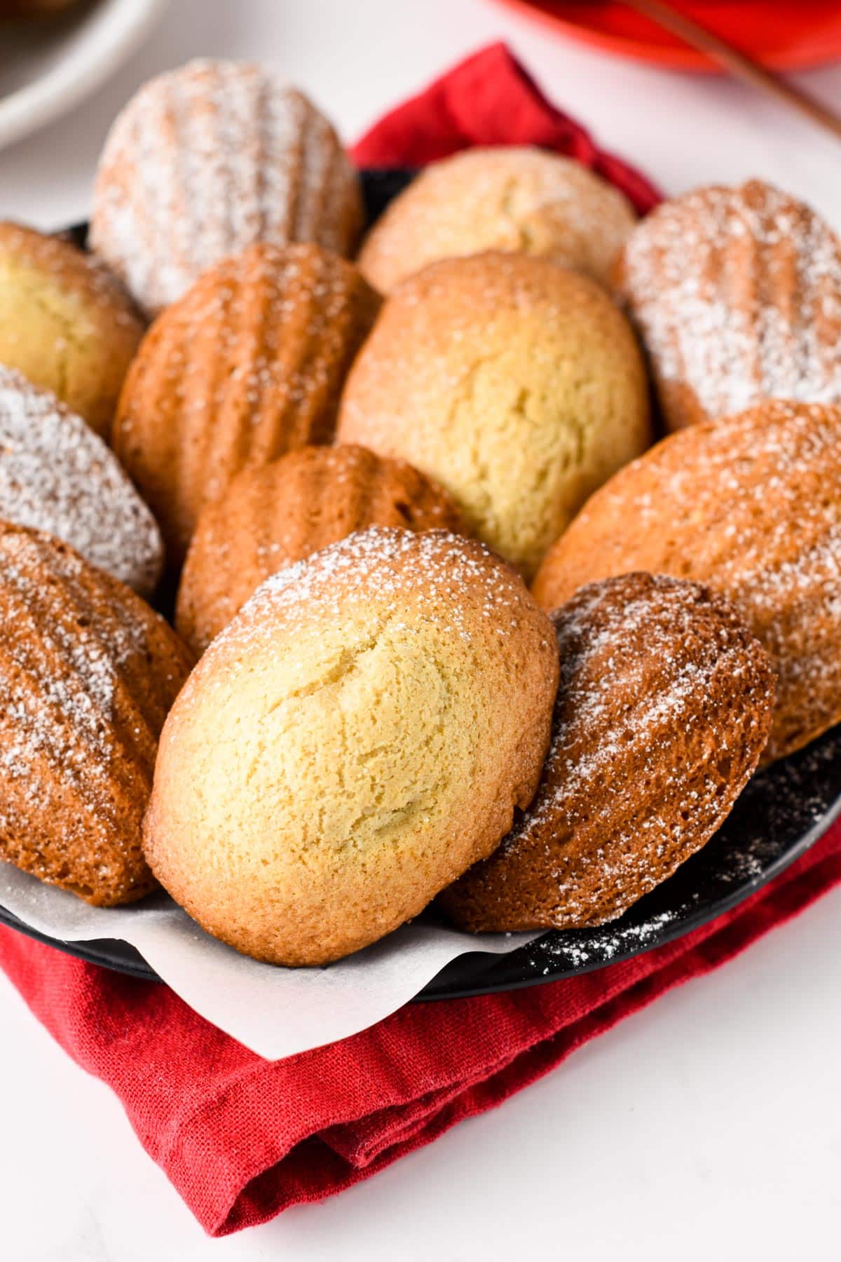 Vegan Madeleines bundled in a small basket.