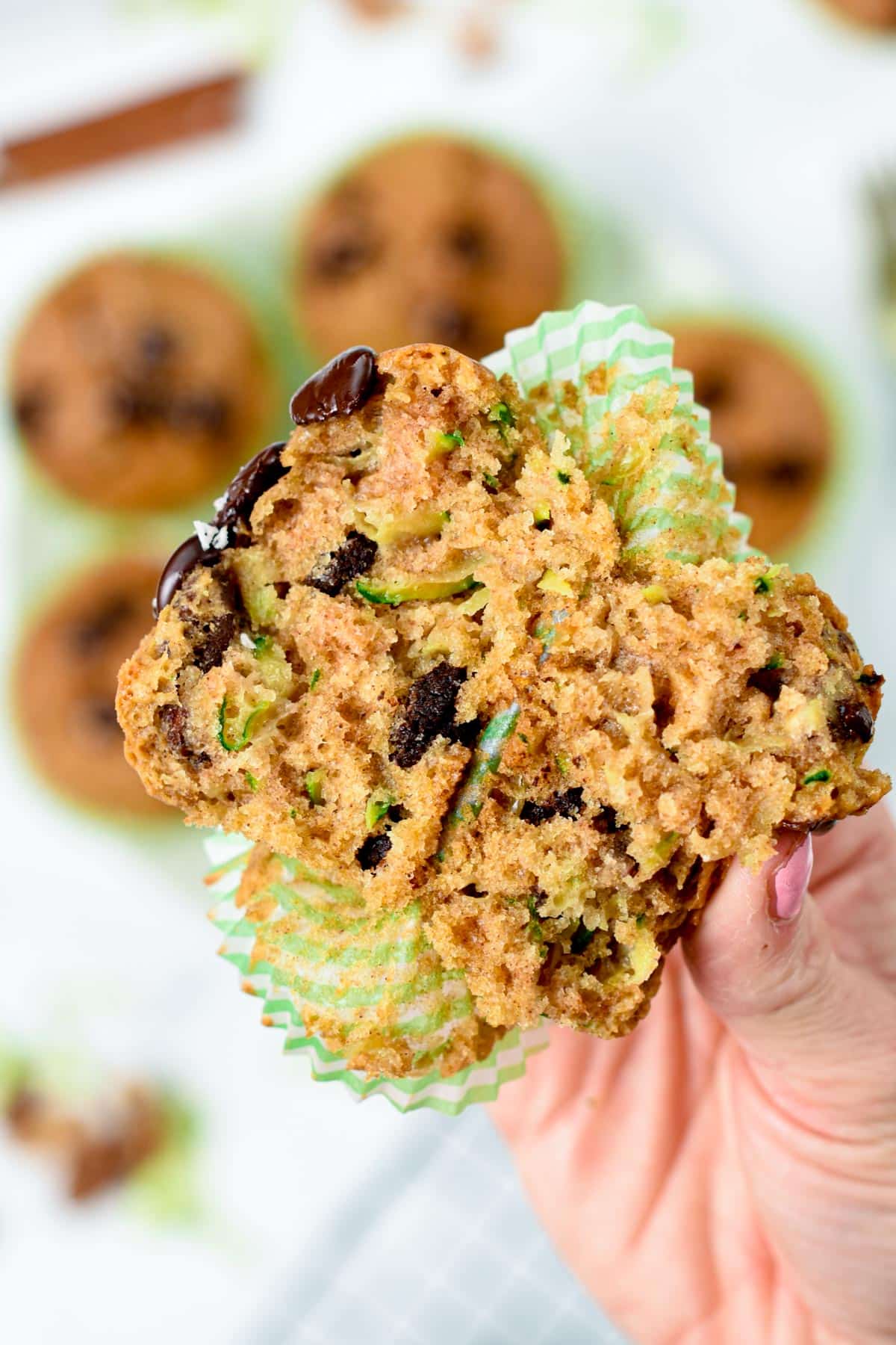 Vegan Zucchini Muffins sliced open to show the texture.