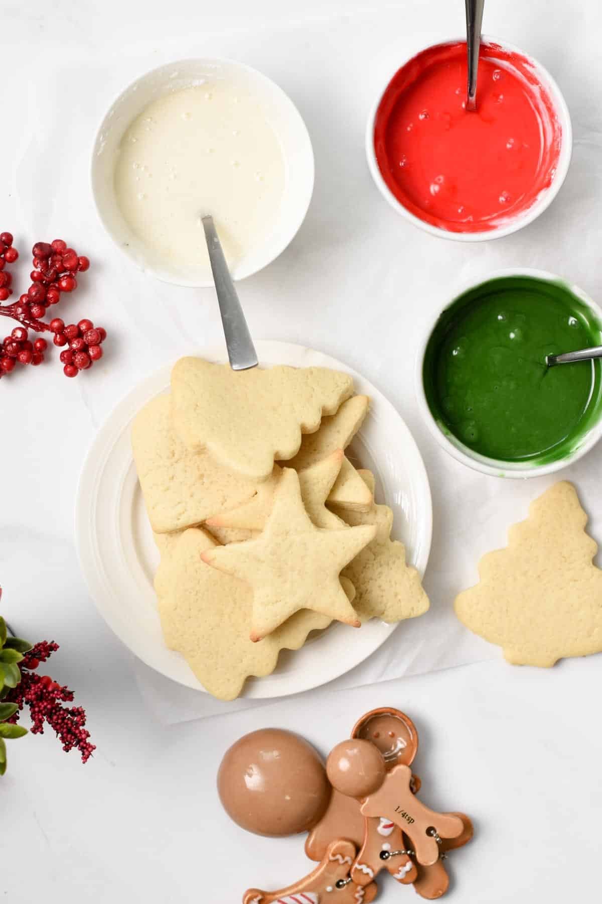 Decorating Vegan Sugar Cookies with various colored icings.
