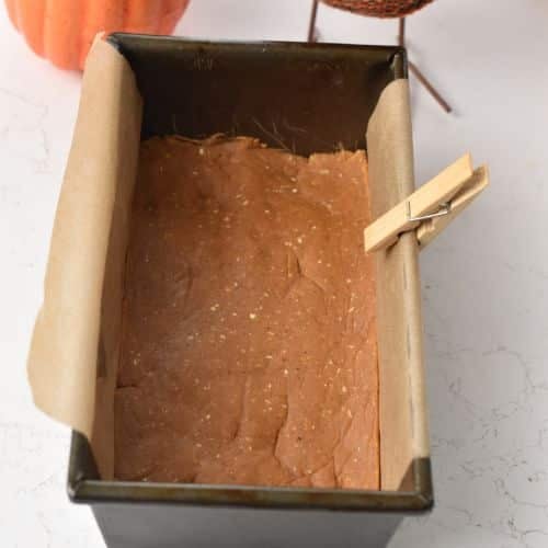 Pumpkin Protein Bar base pressed in a loaf pan.