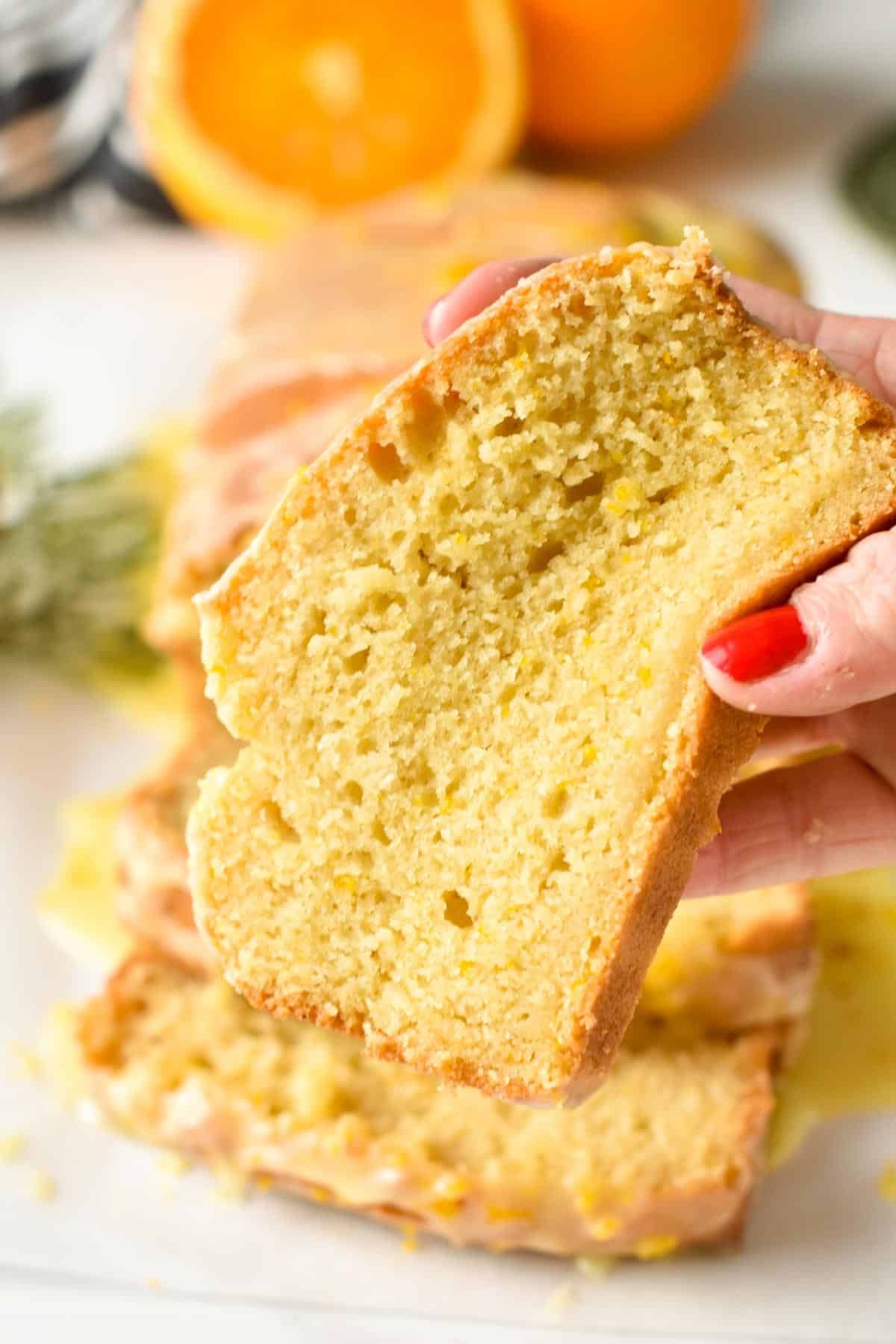 A slice of Orange Pound Cake showing the airy texture.