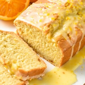 This Orange Pound Cake is most easy moist pound cake with tangy orange flavors and delicious sweet orange glaze. Plus, this pound cake is allergy friendly, made with no eggs or dairy.