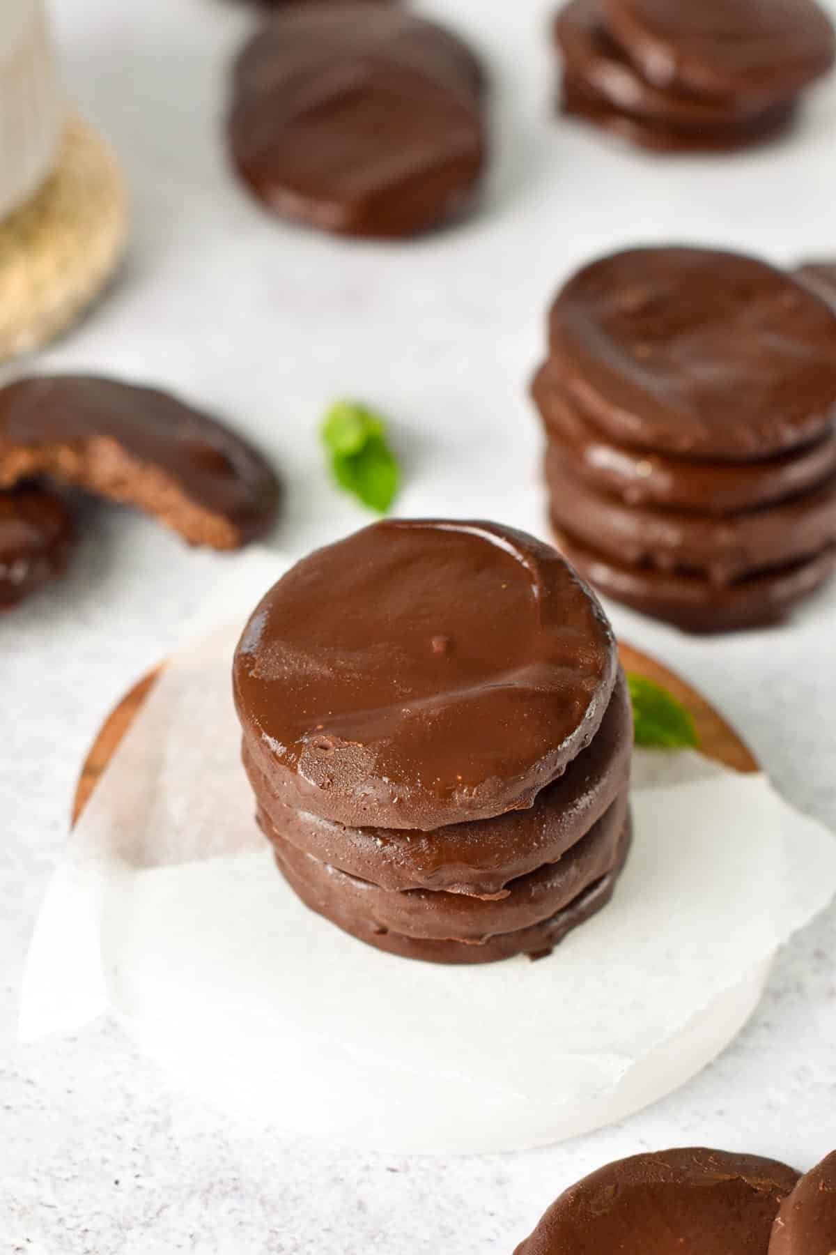 Healthy Thin Mints stacked on a coaster.