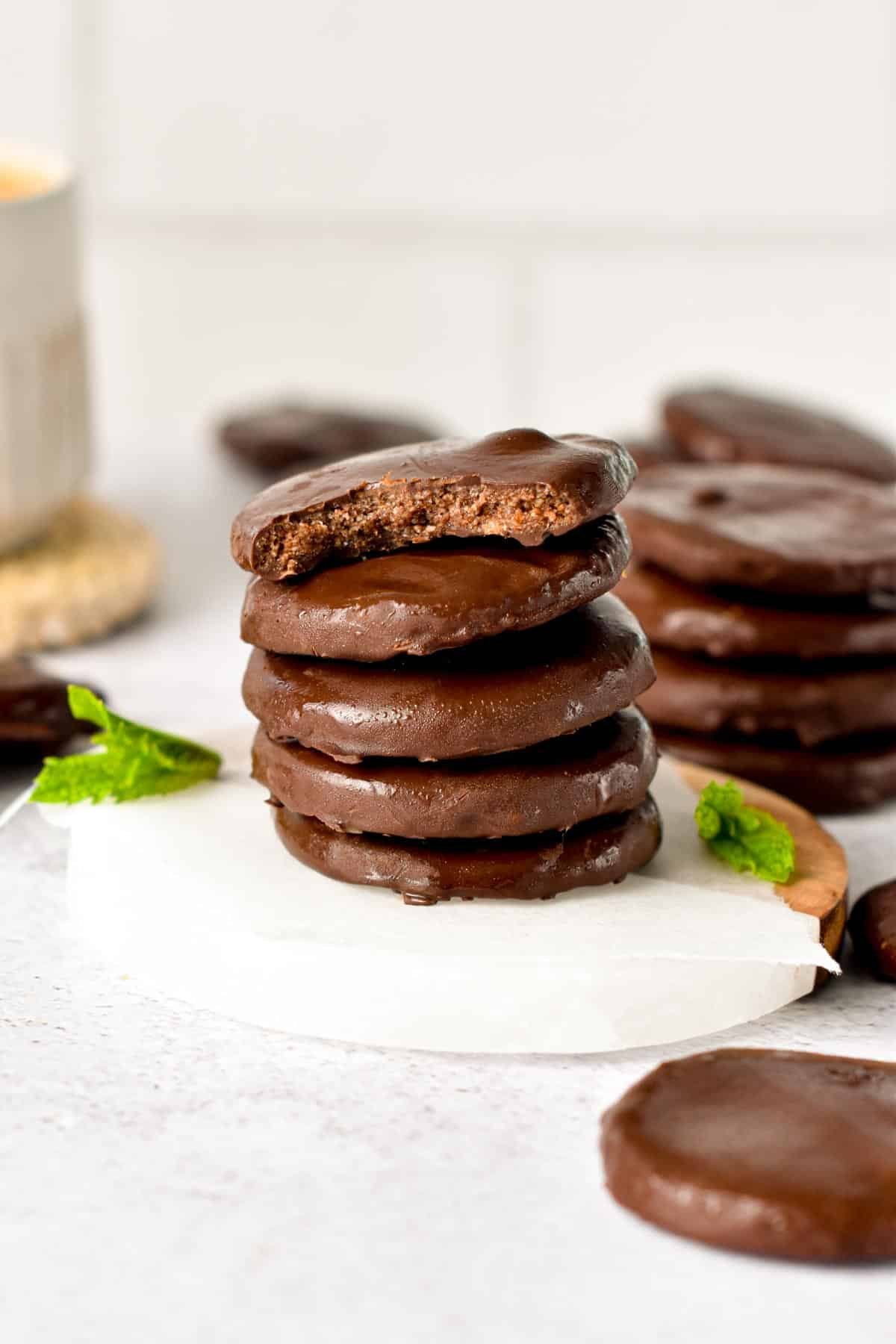 Healthy Thin Mints stacked on a coaster.