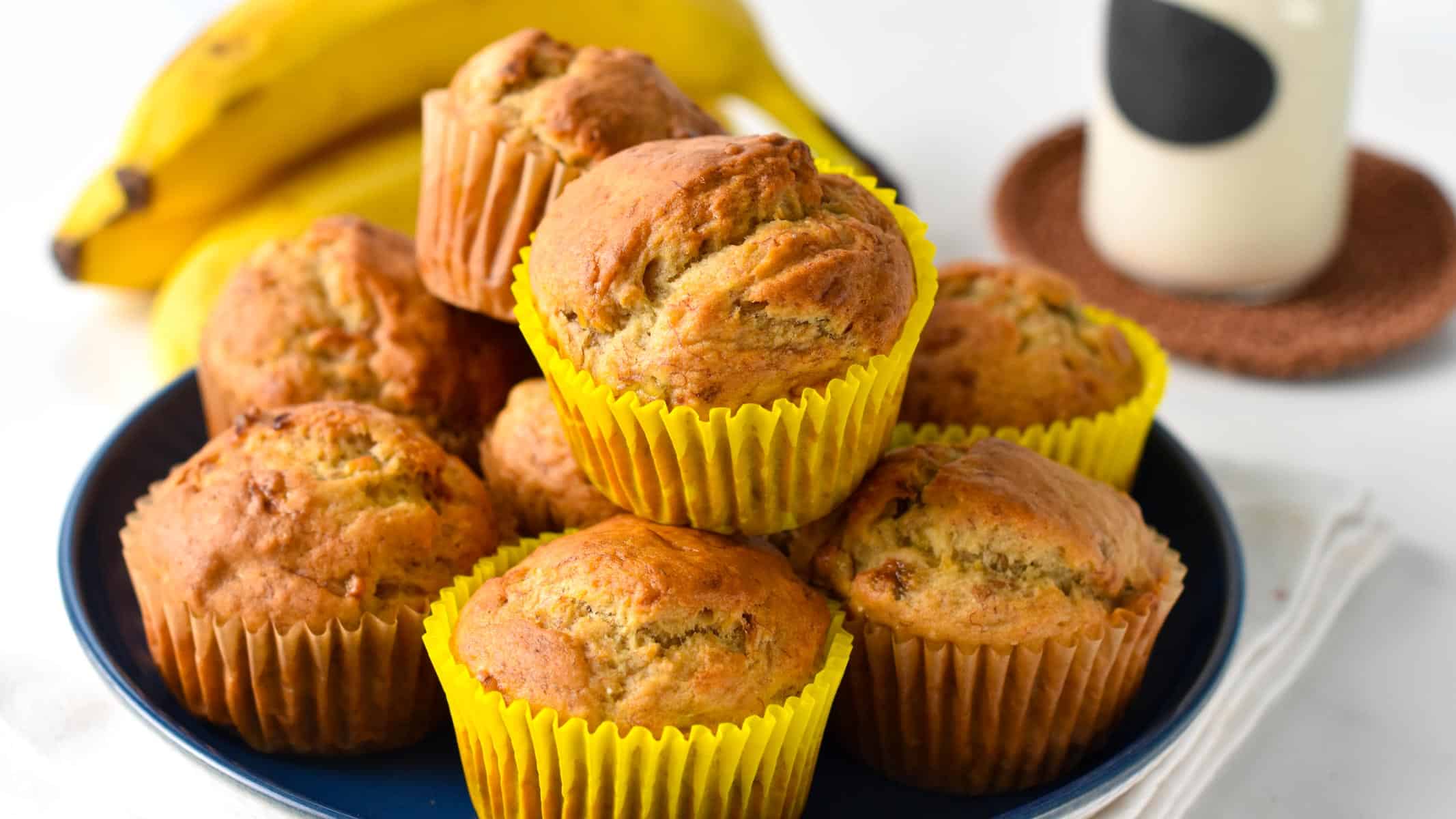 These Eggless Banana Muffins are the most fluffy, soft banana muffins made with no eggs and refined sugar free. It's a great banana muffin recipe for anyone allergic to eggs, or on a vegan diet.