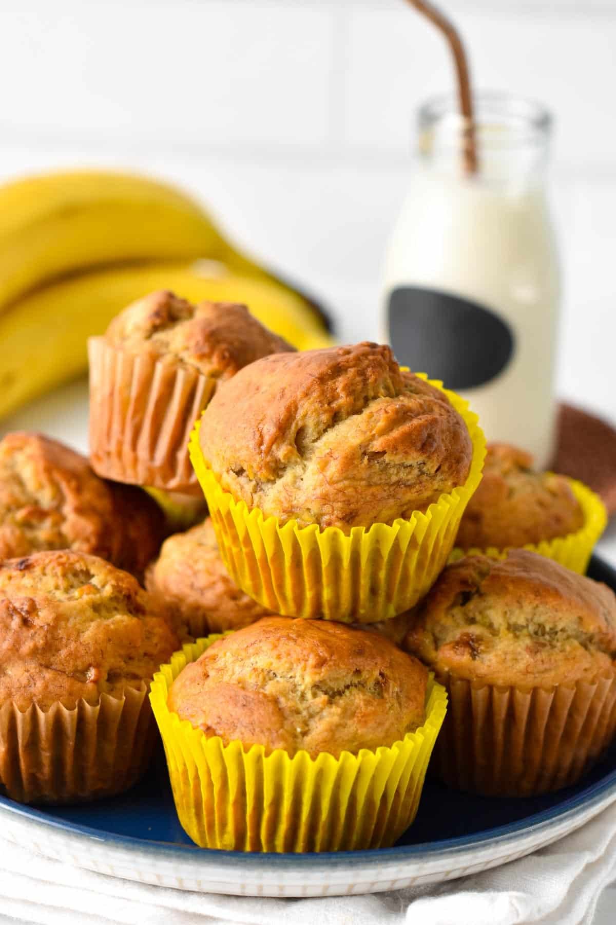 These Eggless Banana Muffins are the most fluffy, soft banana muffins made with no eggs and refined sugar free. It's a great banana muffin recipe for anyone allergic to eggs, or on a vegan diet.