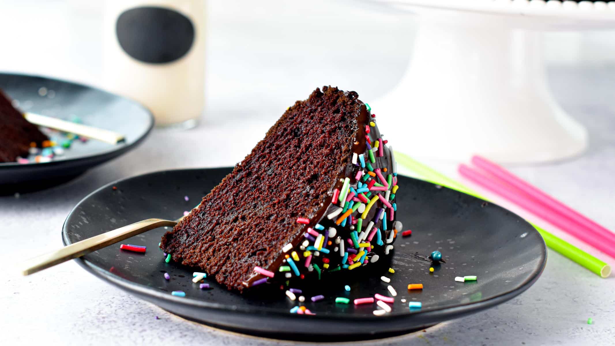 This Eggless Cake recipe is an easy one-bowl egg-free chocolate cake recipe with the most delicious moist cake crumb. Plus, the cake is also dairy-free and vegan approved.