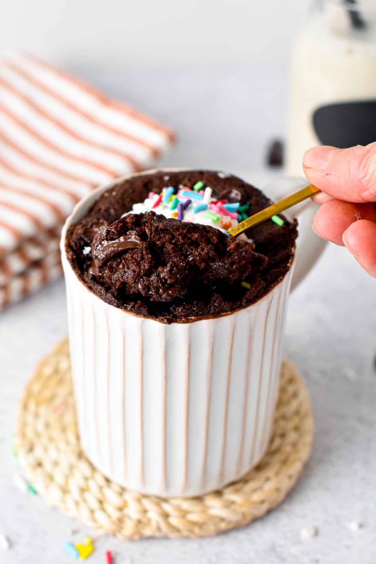 This Vegan Gluten-free Mug Cake recipe is a delicious single serve chocolate cake baked in your microwave in 90 seconds to fix your sweet tooth. Plus, this is a vegan oil-free mug cake too, perfect if you are looking for oil-free baking recipe.
