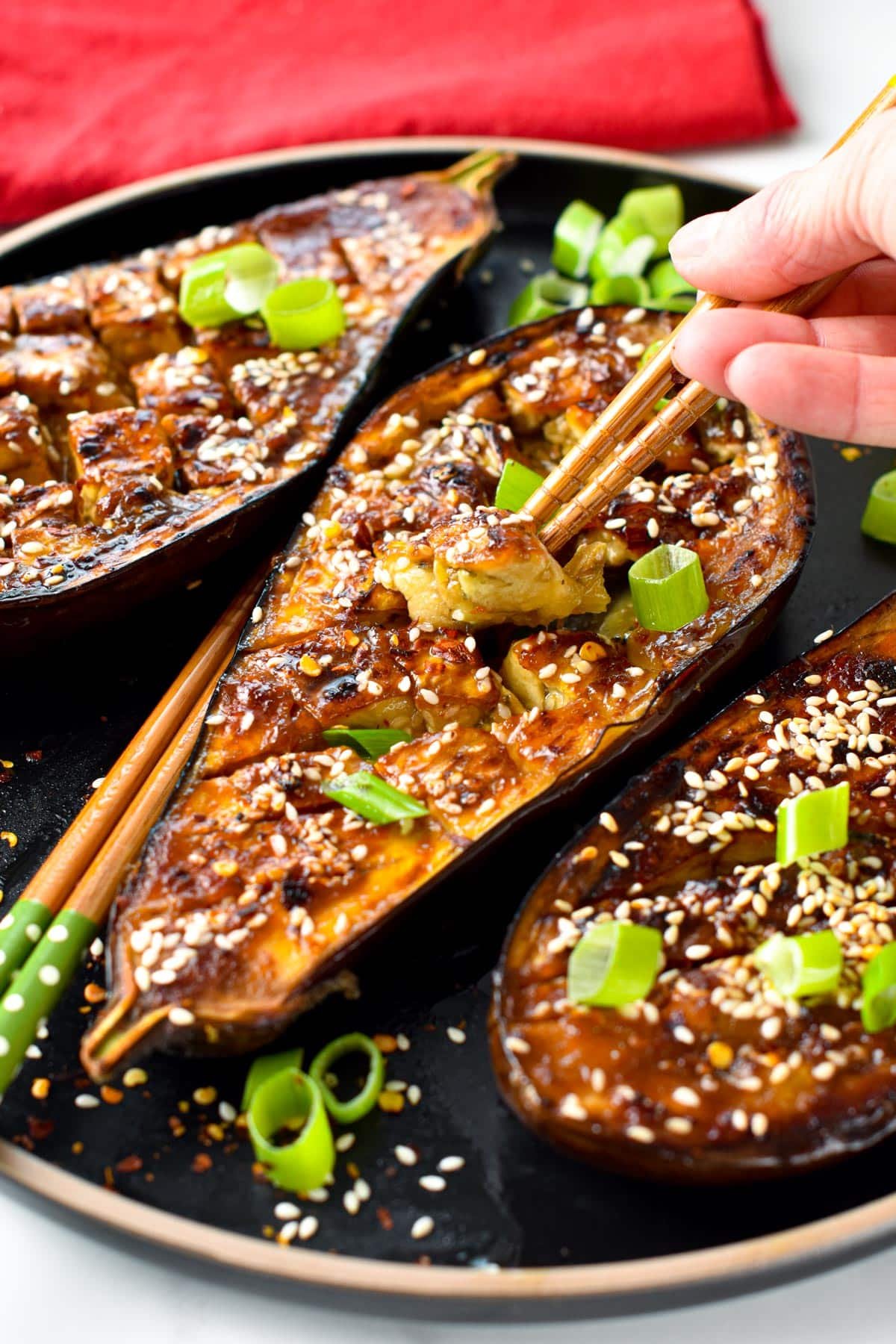 These delicious Miso Glazed Eggplant melt-in-your mouth with the most delicious sweet and savory miso glaze. Bonus, this delicious Asian-style recipe is also vegan and gluten-free.