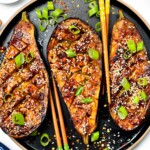 These delicious Miso Glazed Eggplant melt-in-your mouth with the most delicious sweet and savory miso glaze. Bonus, this delicious Asian-style recipe is also vegan and gluten-free.