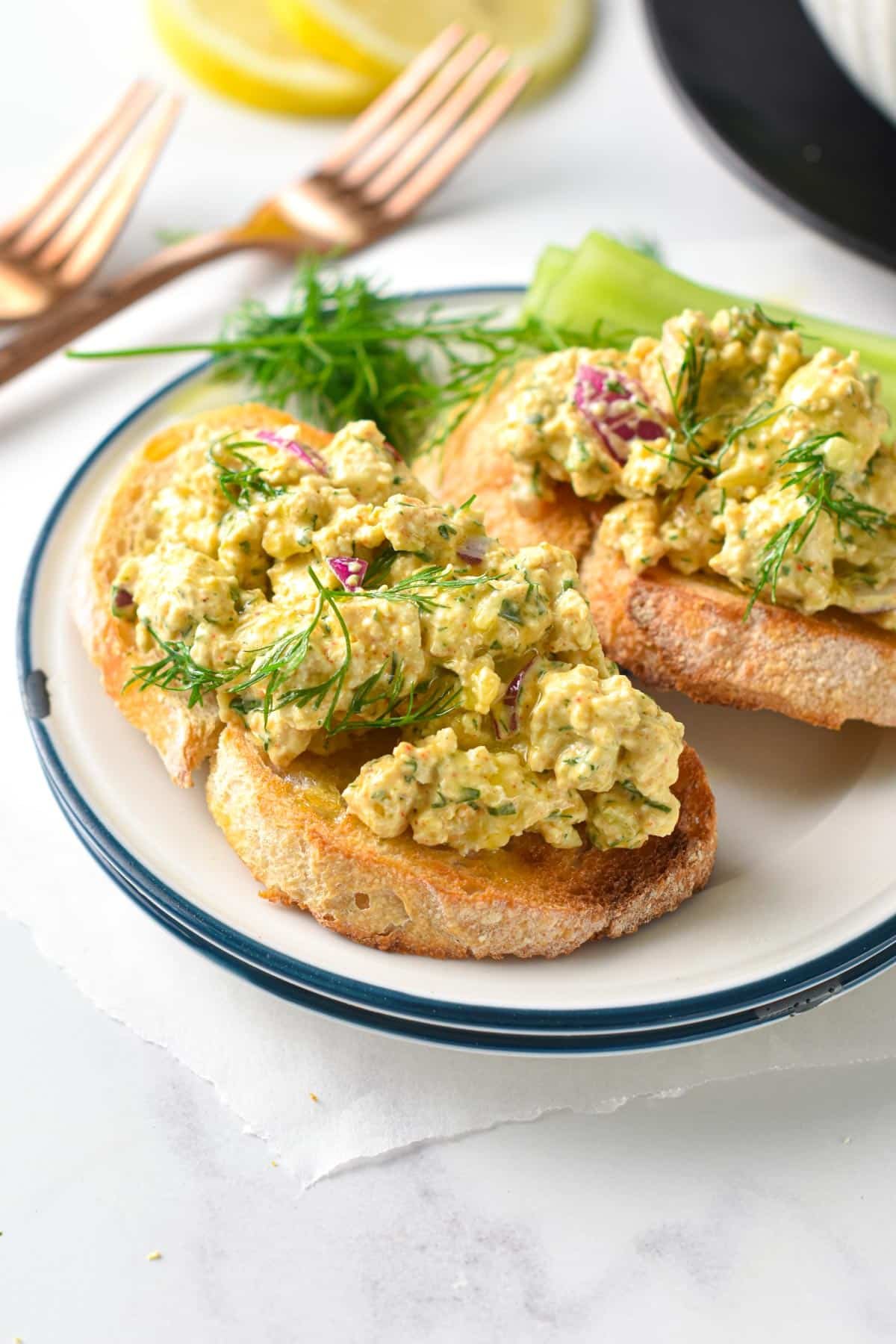 This Tofu Egg Salad is a high-protein meal perfect to make tofu sandwich or fill lettuce cups for a low-carb vegan dinner. 