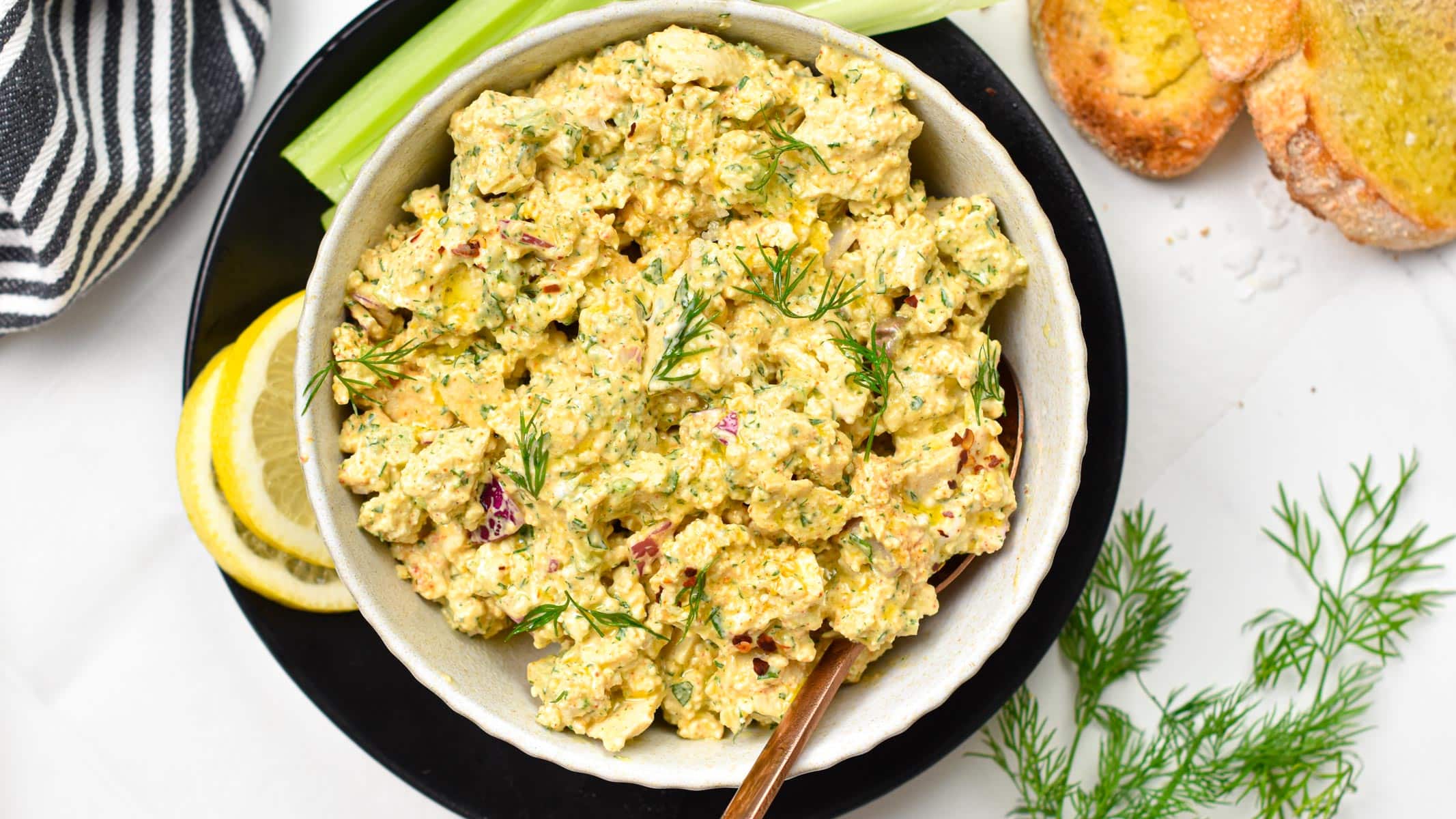 This Tofu Egg Salad is a high-protein meal perfect to make tofu sandwich or fill lettuce cups for a low-carb vegan dinner. 