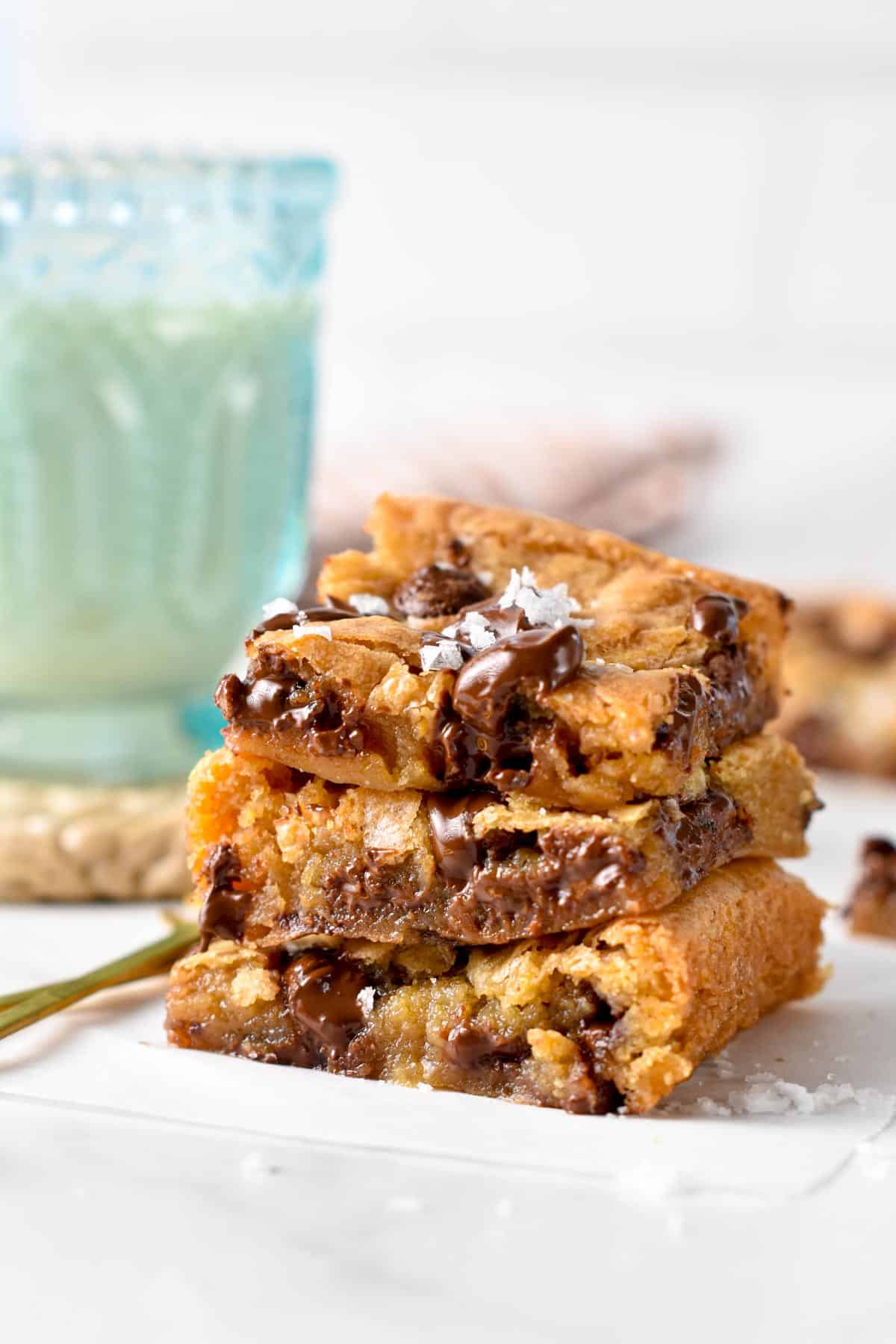 These vegan blondies are chewy, gooey vanilla bars filled with chocolate chips and crispy edges. Plus these vegan blondies are also nut-free and easy to make gluten-free if desired.